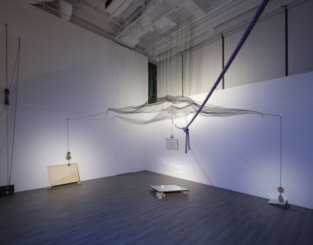 Chang Chih-Chung, The Coral Island, 2021, Fishing net, ocean debris (hauling lines), coral stones, metal equipment, ready-mades, laser level, framed printed documents, LED light , Dimensions variable